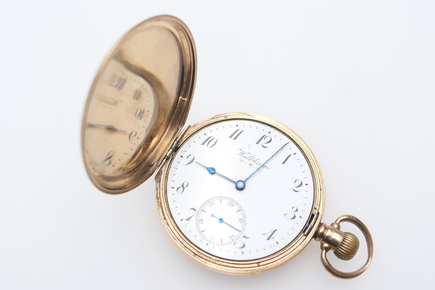 Waltham 9ct gold cased hunter pocket watch, the outer case engraved with a monogram, white dial with