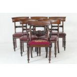 Set of five George IV mahogany dining chairs, circa 1825-30, each with curved top rail and carved
