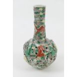 Chinese famille verte moulded biscuit porcelain bottle vase, late 19th Century, pierced and relief