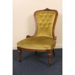 Victorian walnut and inlaid lady's nursing chair, green fabric deep buttoned pad back and seat,