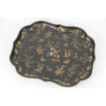 Late Regency black lacquered papier mache serving tray, circa 1820-30, decorated throughout with