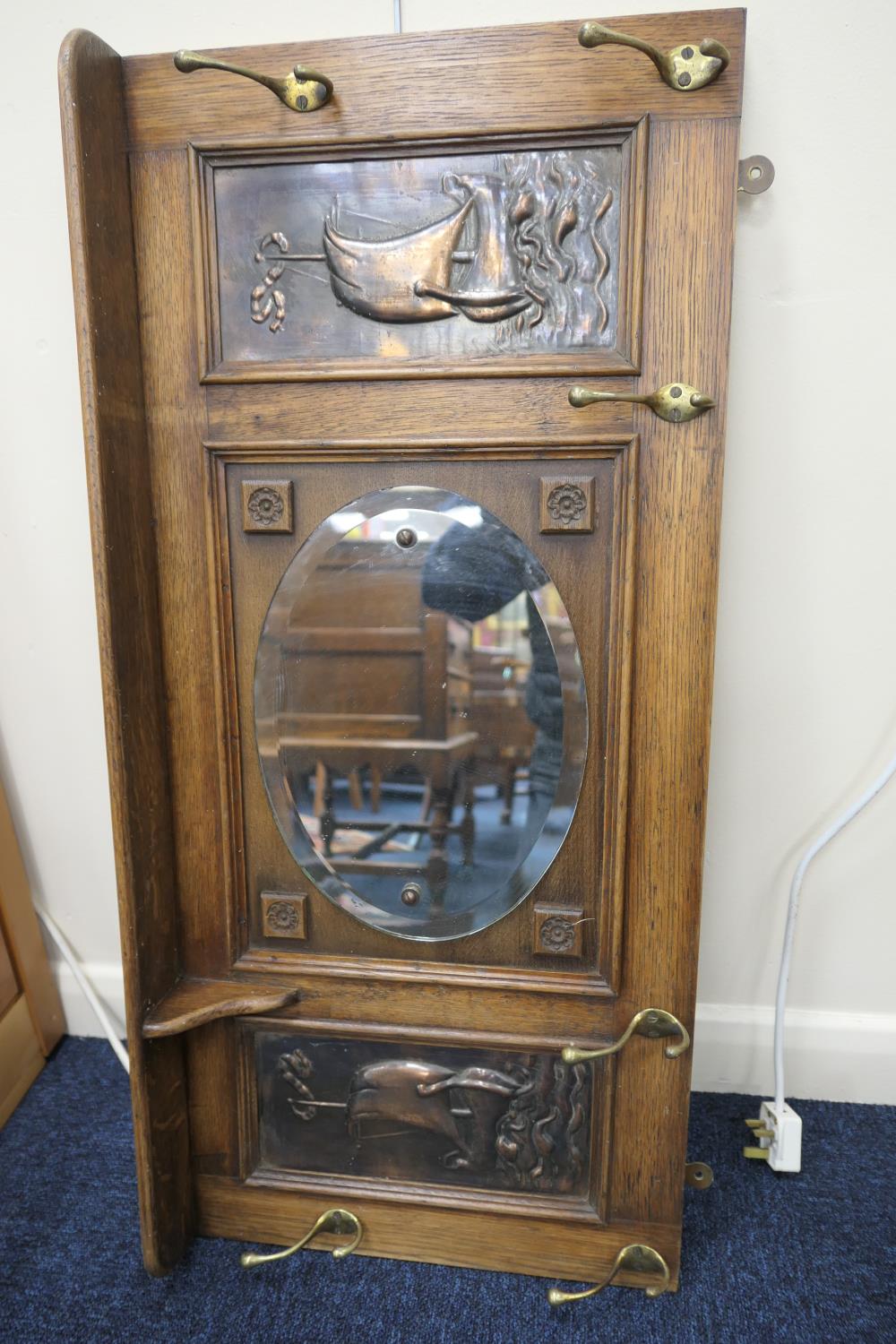 Arts and Crafts period mirrored oak wall mounted hall stand, fitted with an upper shelf over an oval - Image 2 of 5