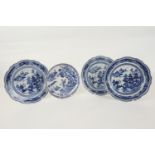Three Chinese blue and white plates, late 18th Century, decorated with a pagoda landscape design