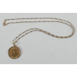 Edward VII half sovereign, 1905, in a 9ct gold pendant mount, suspended from a 9ct gold chain