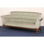 Victorian walnut and upholstered settee, circa 1860-90, finished in deep buttoned sage green fabric,