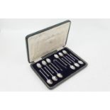 Set of twelve George V silver hobnail teaspoons, Sheffield 1921, and sugar tongs, gross weight