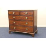 Late George III oak and mahogany banded chest of drawers, fitted with two short and three long