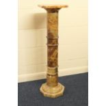 Alabaster torchere, square top over a column with an octagonal base, height 97cm, width 26cm