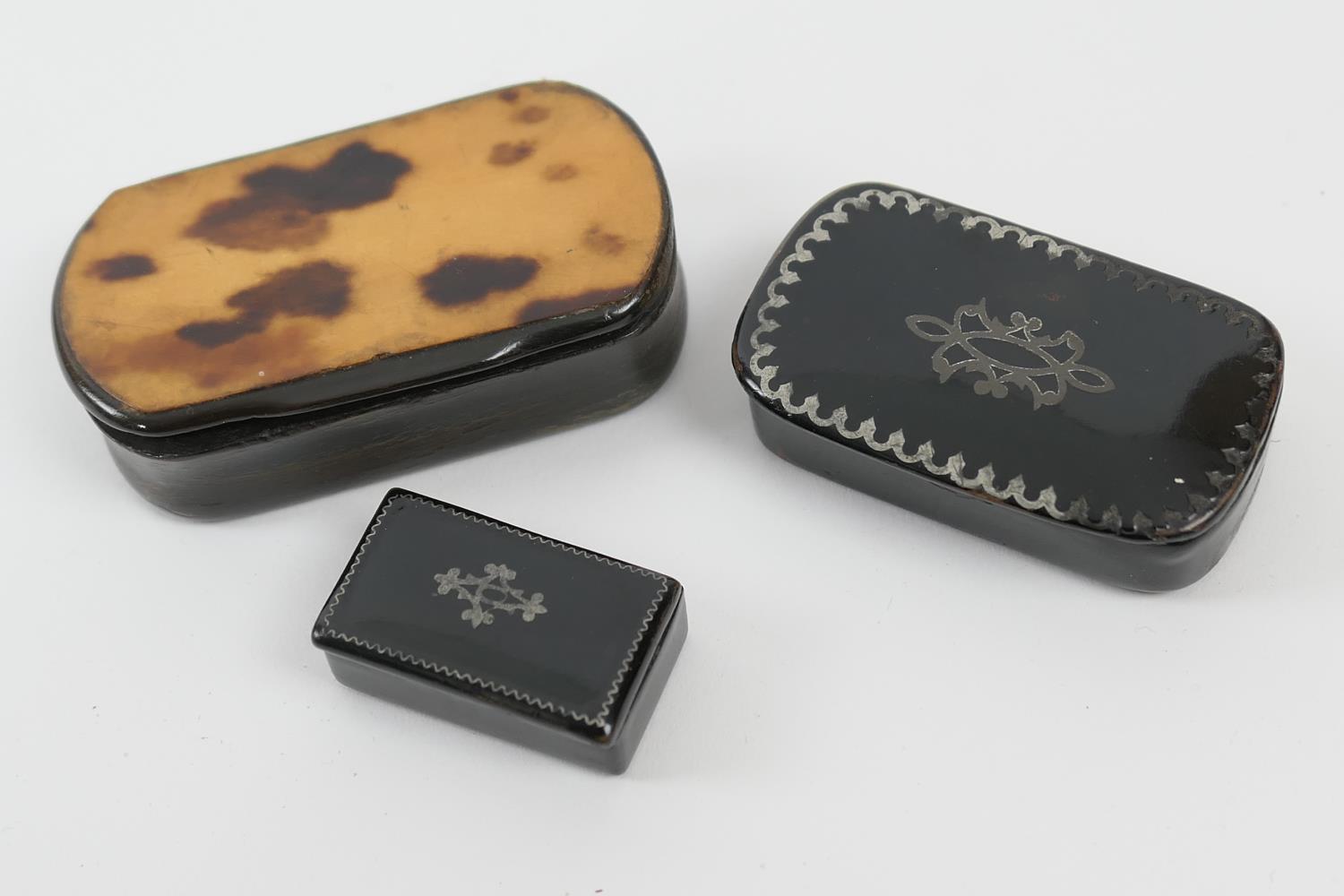 Tortoiseshell and horn snuff box, early 19th Century, 7cm x 4cm; also two Victorian papier mache