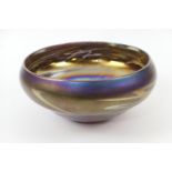 Large iridescent glass bowl in the manner of John Ditchfield, inscribed to the base 'As a gift