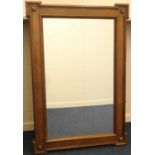 Walnut framed overmantel mirror, rectangular plate bordered with a geometrically moulded frame