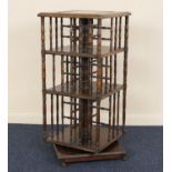 Victorian walnut revolving bookstand, traditional square form with turned divisions and supports