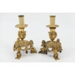 Pair of French ormolu figural dwarf candlesticks, converted to lamps, height to the nozzle 15cm