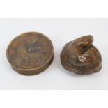 George III pressed horn snuff box, circular form decorated with an indistinguishable group of