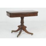 Regency mahogany folding pedestal tea table, circa 1825, the top swivelling and folding over a plain