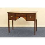 Edwardian mahogany and inlaid bow front dressing table, in Georgian style, fitted with three drawers