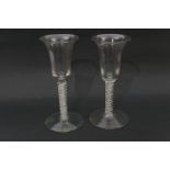 Pair of opaque twist wine glasses, bell shaped bowl over a double helix twist stem and conical foot,