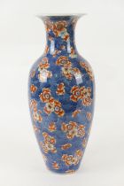 Chinese clobbered blue and white vase, late 19th Century, decorated with prunus blossom, and later