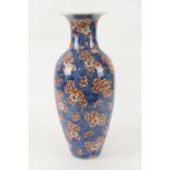 Chinese clobbered blue and white vase, late 19th Century, decorated with prunus blossom, and later