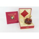 Remy Martin Louis XIII Grande Champagne Cognac, presented in a Baccarat crystal decanter, with