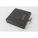 Early Victorian tooled Morocco leather box, of book form with finely engraved flush fitting carrying
