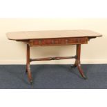 Late Regency mahogany sofa table, circa 1820, the top crossbanded with rosewood and having two