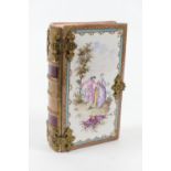French faience book box, circa 1900-20, decorated with figures in 18th Century Romantic style,