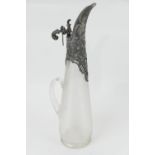 Continental pewter mounted claret jug, late 19th Century, the vessel of finely reeded clear glass