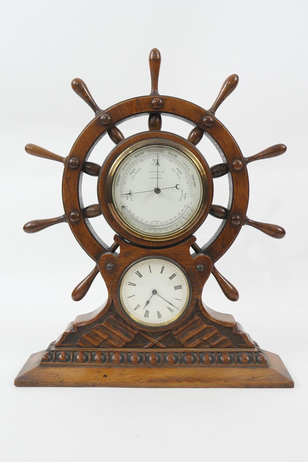 Nautical interest: Late Victorian oak cased ship's wheel barometer and clock, signed F. Darton &