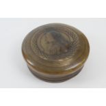 Georgian pressed horn snuff box, circa 1760, circular form, the cover with a profile of George III