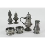 Small assortment of 19th Century pewter items including three baluster pepperettes, a pair of London