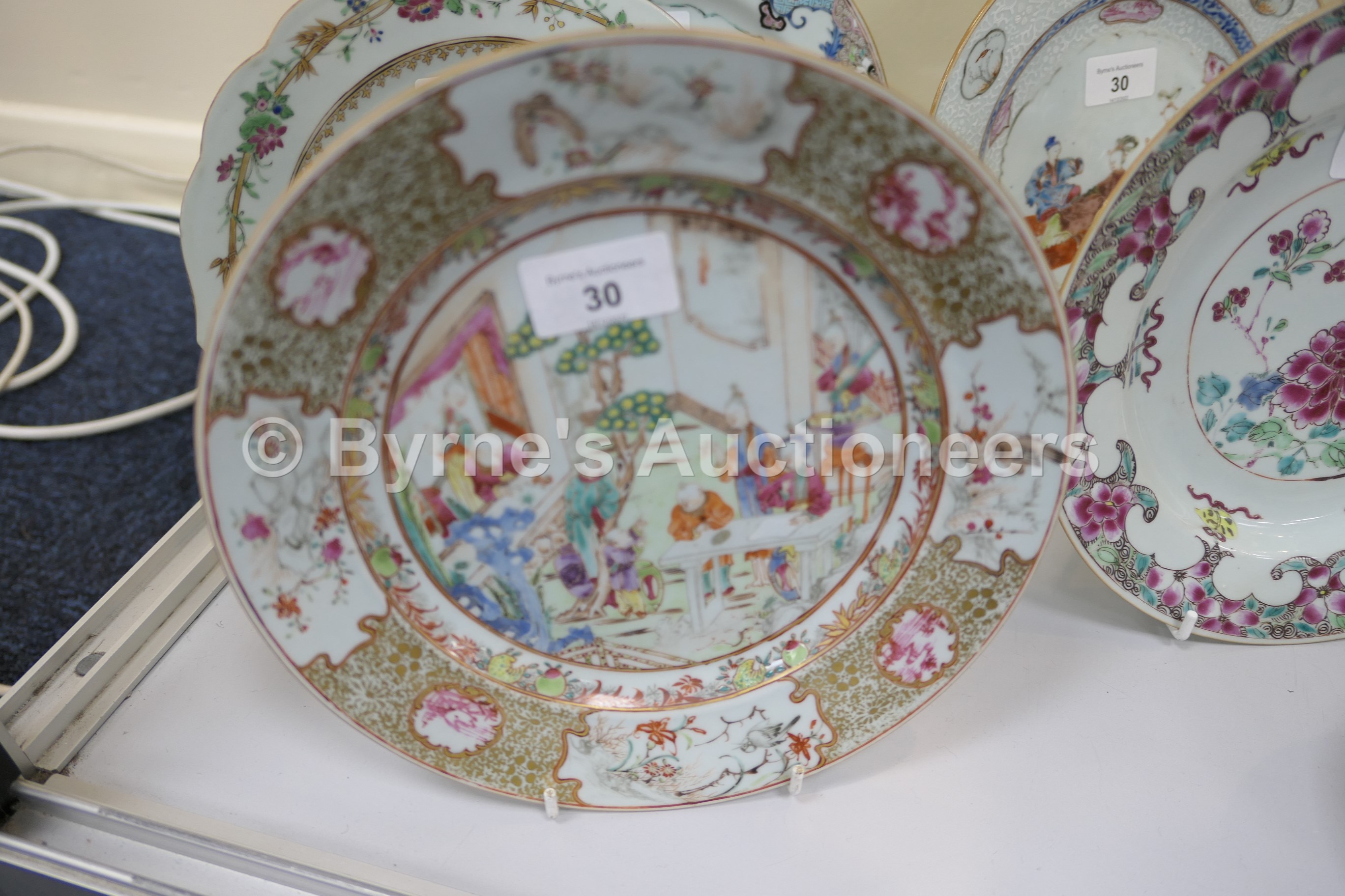 Five Chinese famille rose plates, all 18th Century, including an armorial plate, 22.5cm; Mandarin - Image 2 of 8