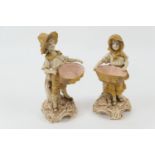 Pair of Austrian porcelain figural table salts, circa 1900, modelled as a boy and girl, each