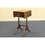 Regency rosewood work table, circa 1820, the top with an egg and dart moulded border, and two drop