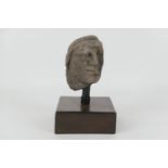 Medieval carved sandstone head of a man, his face carved serenely, English 13th/14th Century,