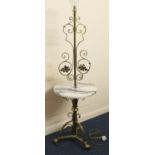 Brass and marble standard/wine table lamp, raised on triform supports on paw feet, height 144cm,