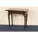 George III mahogany folding tea table, circa 1780, the top with kick-out corners, supported on a