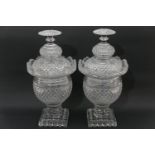 Pair of Irish cut glass lidded jars, 19th Century, strawberry and fan cut throughout with mushroom