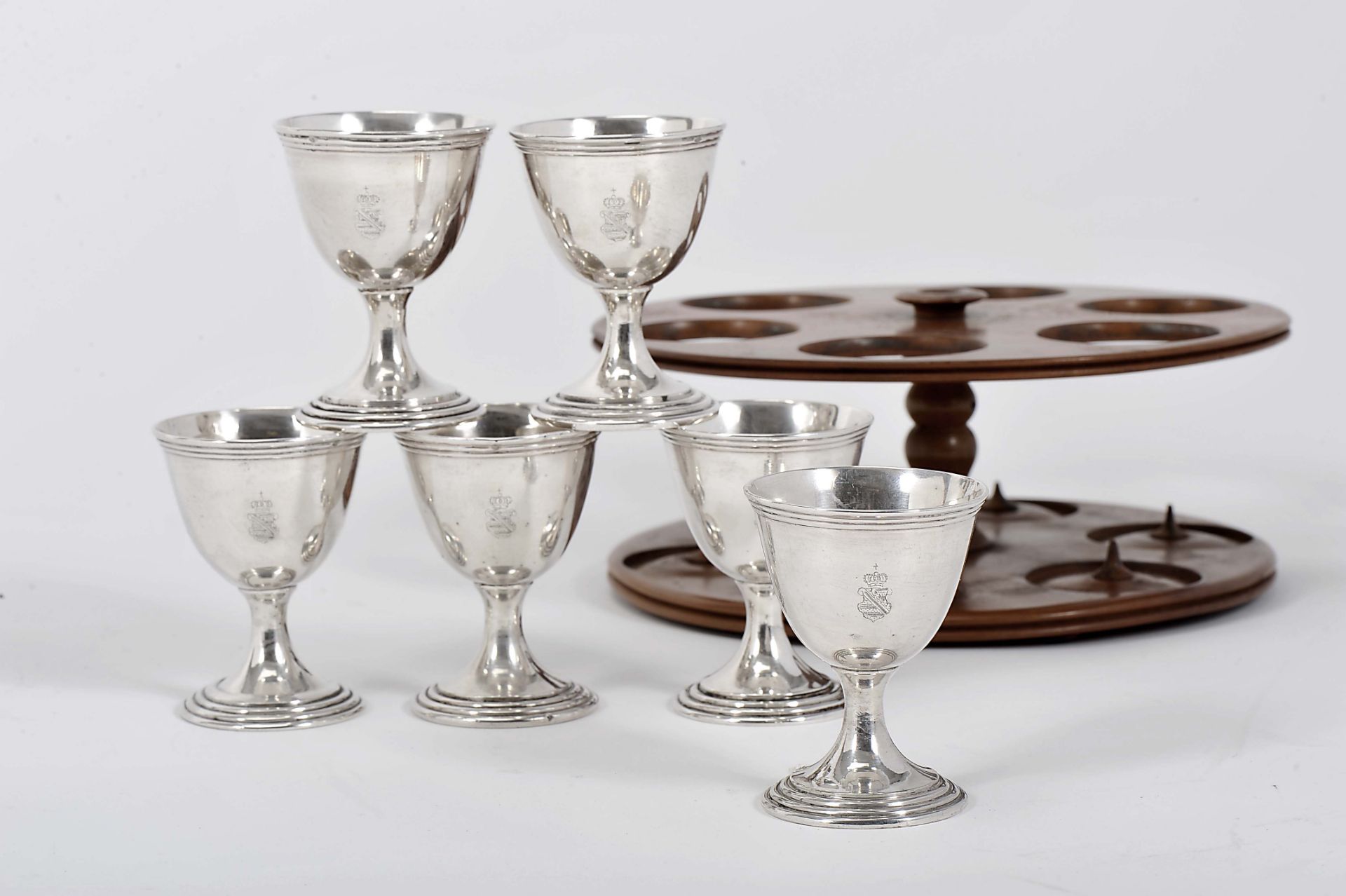 Set of six boiled egg cups with stand