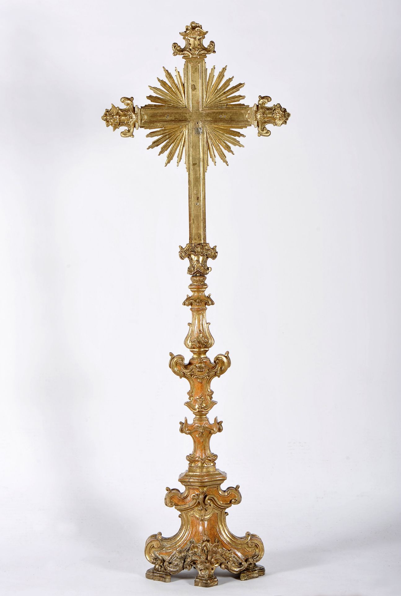 A processional cross in the shape of a torchère