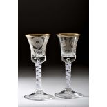 A pair of tall stemmed goblets