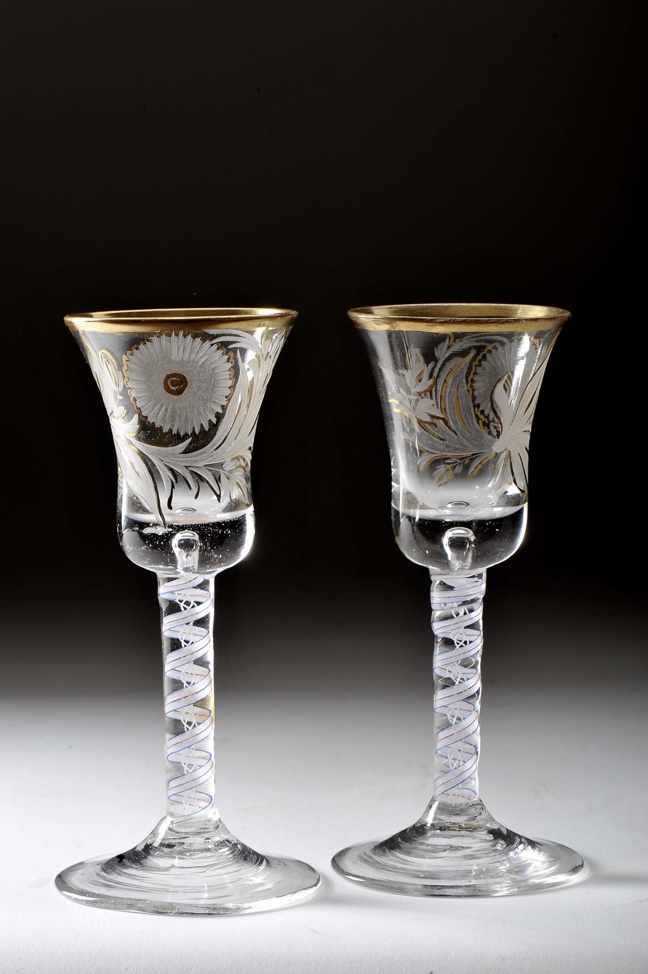 A pair of tall stemmed goblets