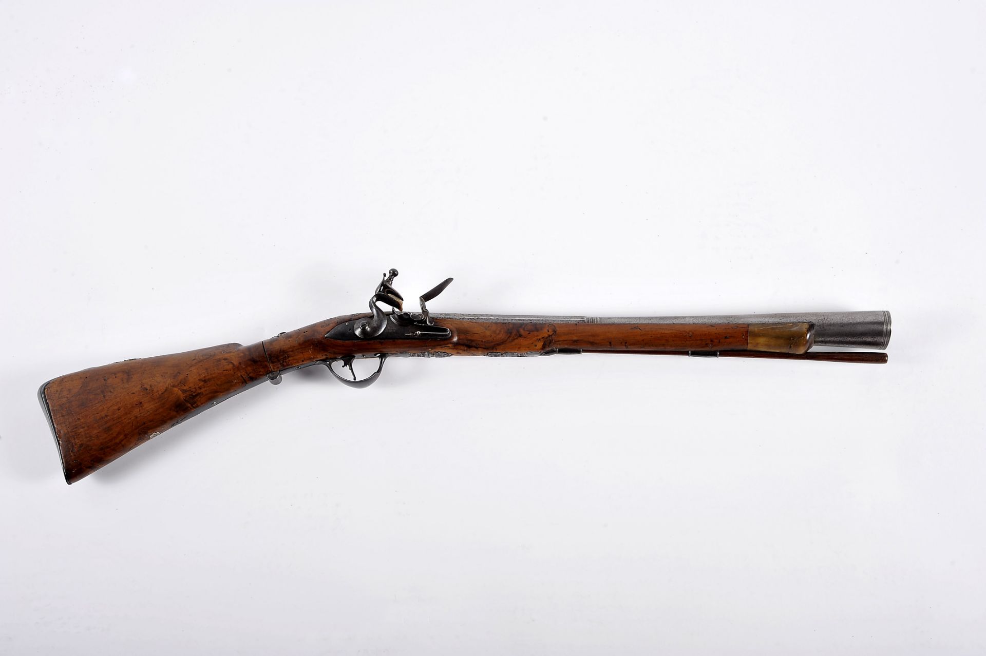 A flintlock blunderbuss with folding stock