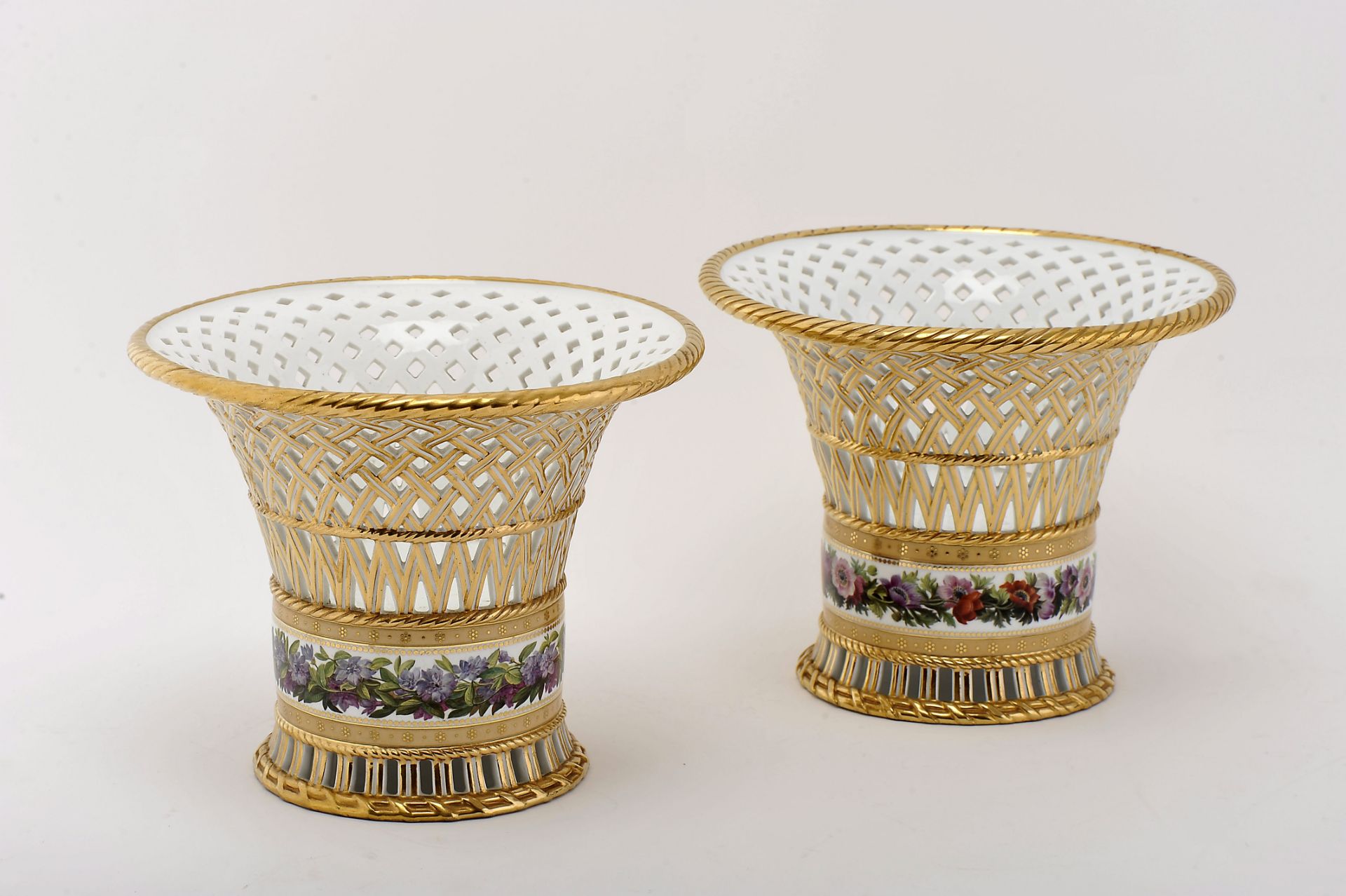 A pair of tall baskets