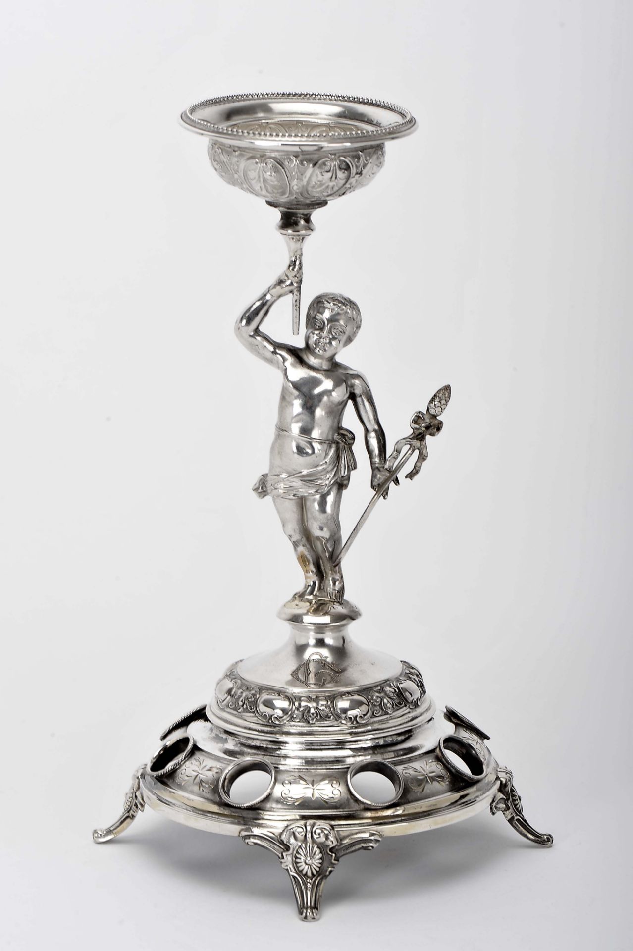 A cigar stand "Putto holding a cup"