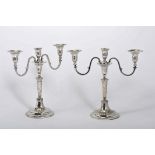 A pair of three-light candelabra