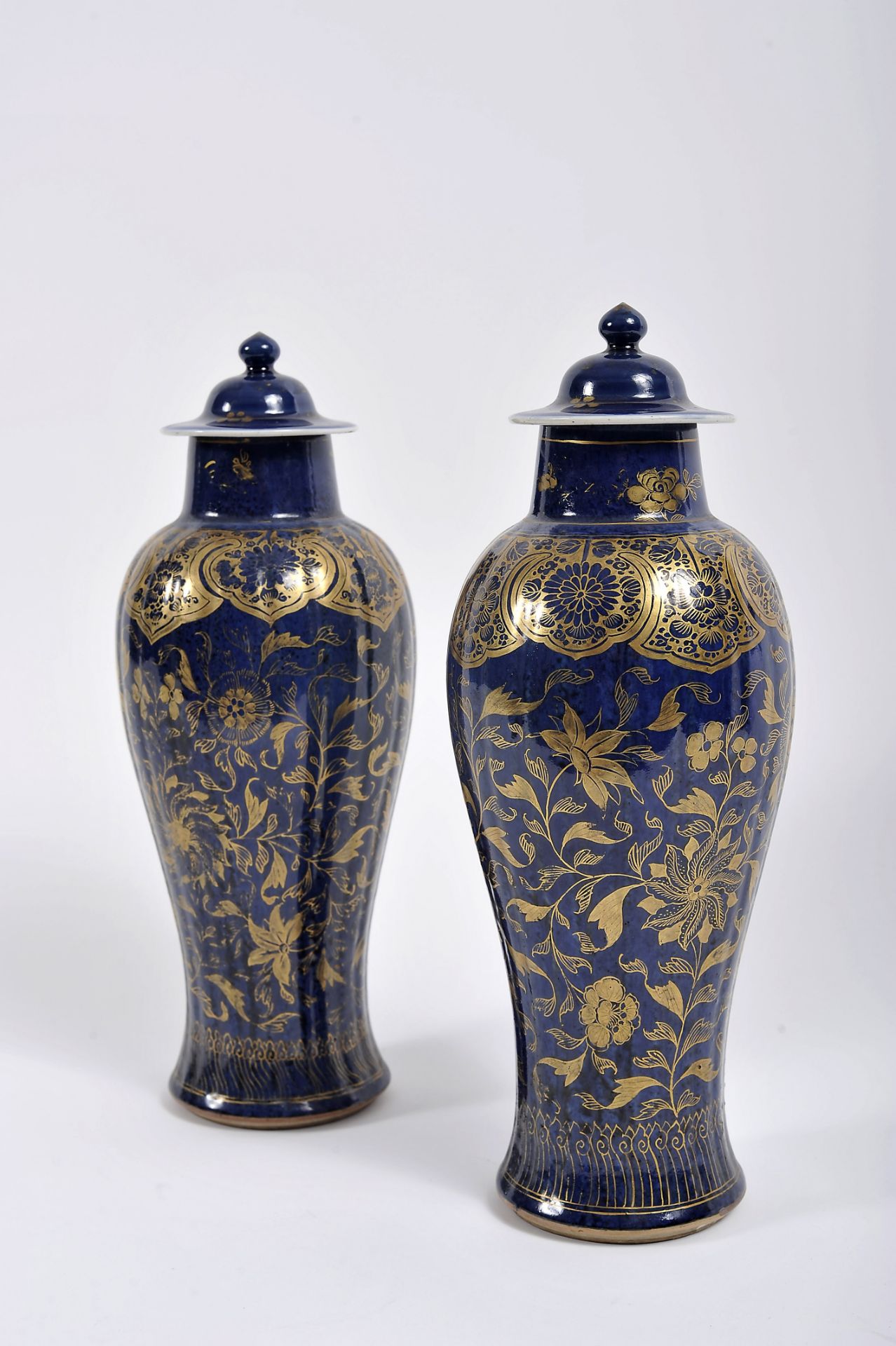 A pair of pots with cover