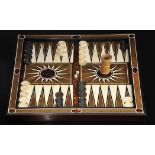 Chess and Backgammon board with backgammon pieces, two dice and cup