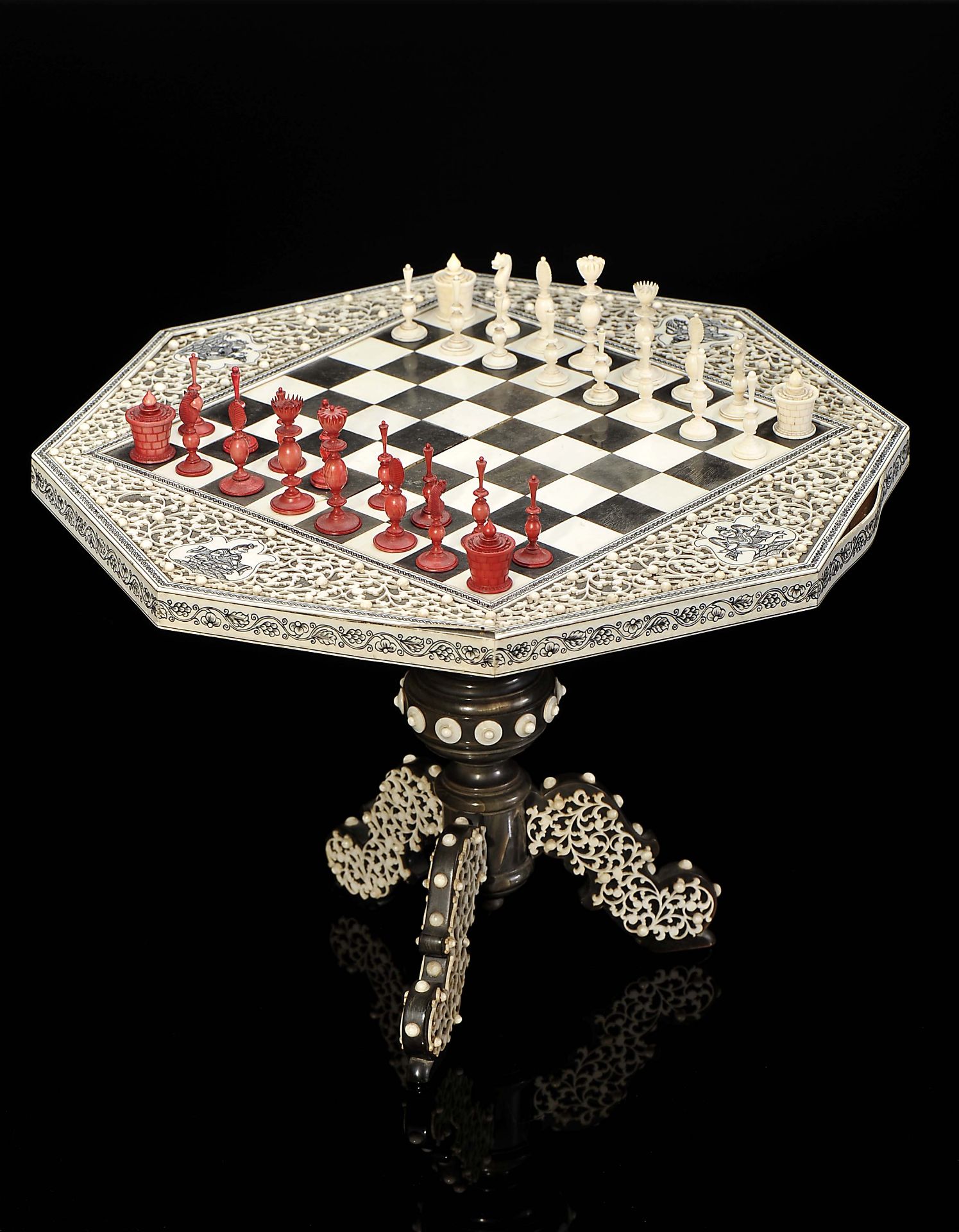 Miniature game table with chess pieces