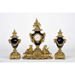 A garniture - clock and pair of urns